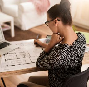 Lady planning layout of your space